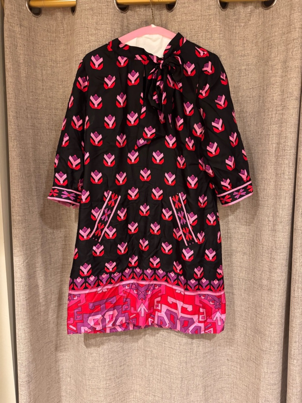 Black Dress with Pink Geometric Print and Bow Neck